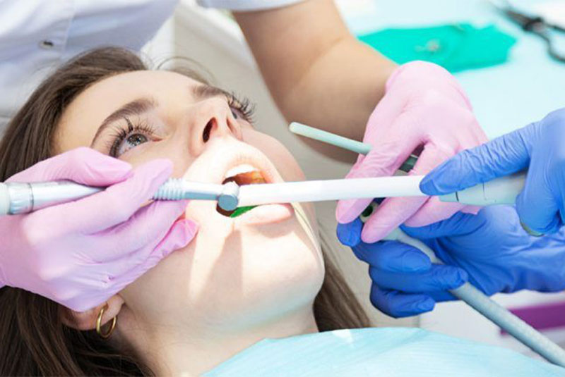 patient having dental treatment within the dental center